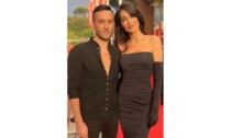 Lo stilista Fabio Porliod e la modella Audrey Chabloz sul red carpet a Roma